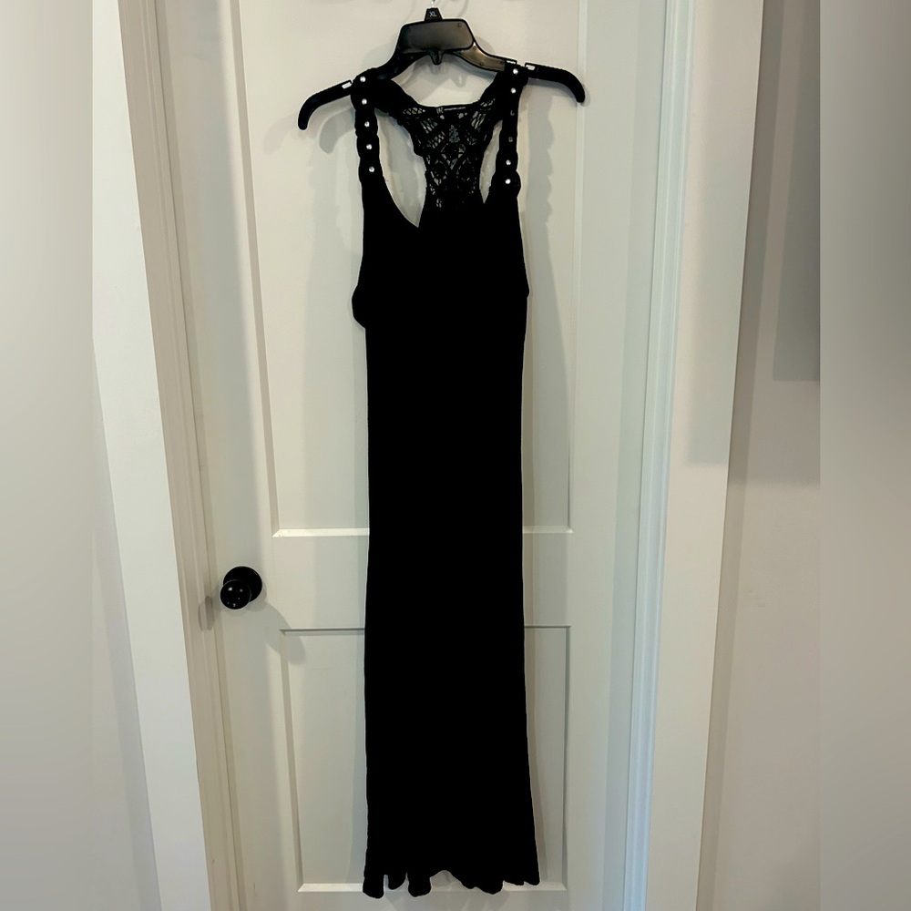 Black cotton knit maxi dress with decorative rhinestone lace razorback.